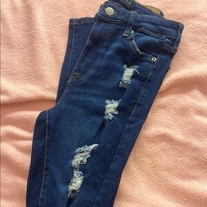 blue ripped jeans